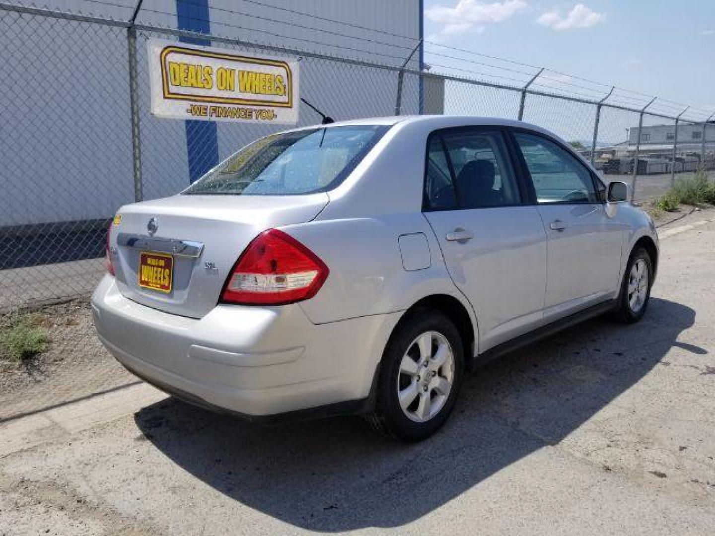 2010 Nissan Versa 1.8 S Sedan (3N1BC1AP9AL) with an 1.8L L4 DOHC 16V engine, located at 601 E. Idaho St., Kalispell, MT, 59901, 48.203983, -114.308662 - Photo#4