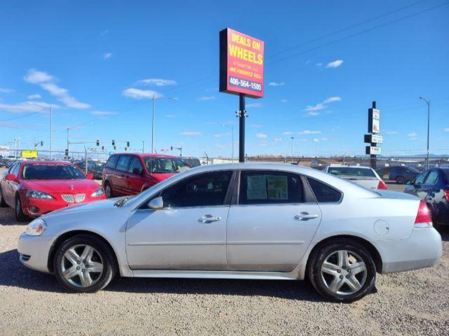 2011 Chevrolet Impala LS (2G1WA5EK3B1) with an 3.5L V6 OHV 16V FFV engine, 4-Speed Automatic transmission, located at 4801 10th Ave S,, Great Falls, MT, 59405, 47.494347, -111.229942 - Photo#1