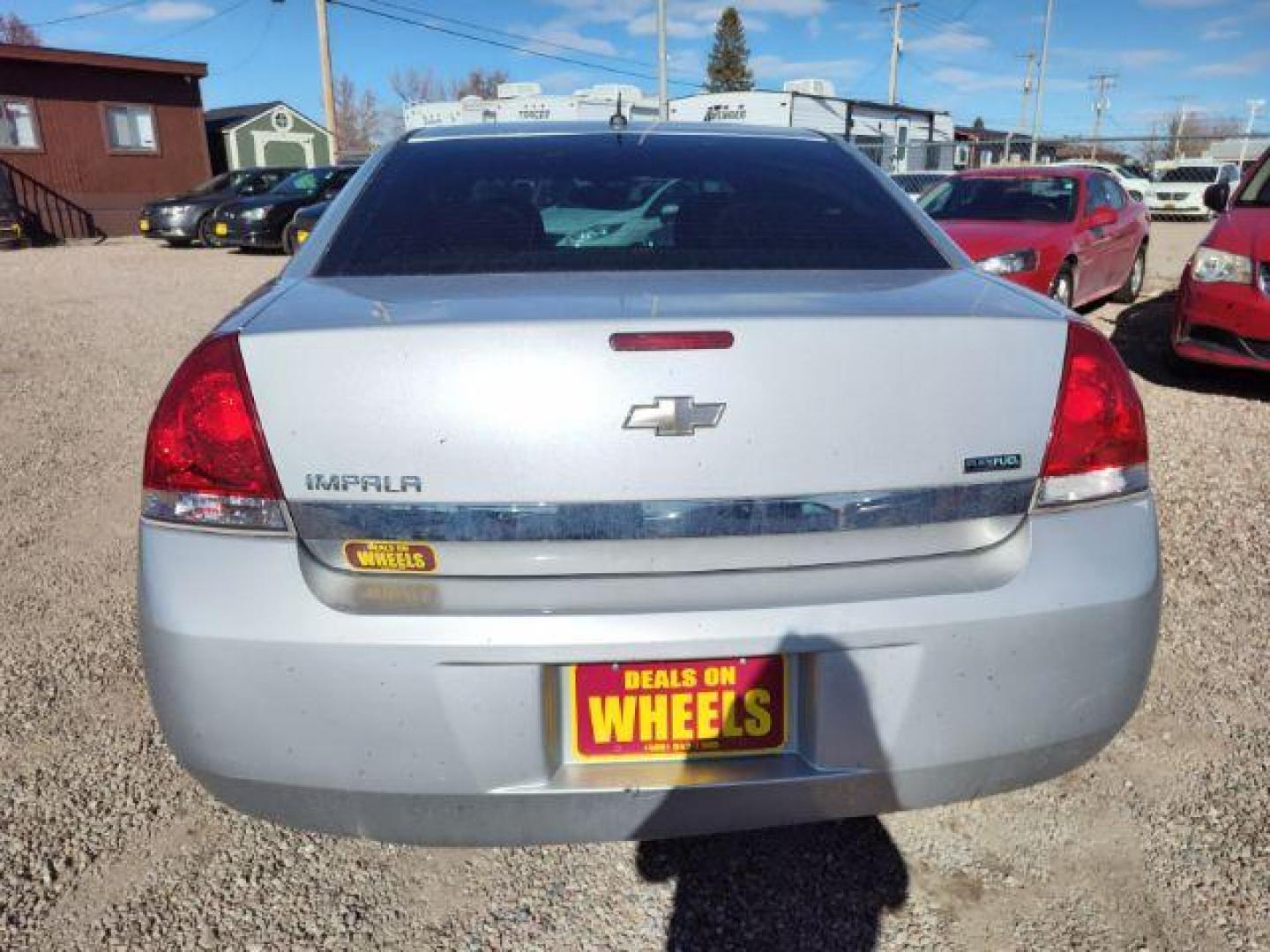 2011 Chevrolet Impala LS (2G1WA5EK3B1) with an 3.5L V6 OHV 16V FFV engine, 4-Speed Automatic transmission, located at 4801 10th Ave S,, Great Falls, MT, 59405, 47.494347, -111.229942 - Photo#3