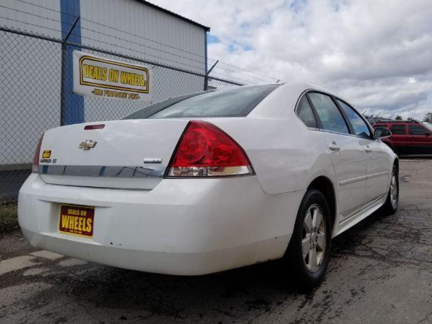 2011 Chevrolet Impala LT (2G1WG5EK4B1) with an 3.5L V6 OHV 16V FFV engine, 4-Speed Automatic transmission, located at 4801 10th Ave S,, Great Falls, MT, 59405, 47.494347, -111.229942 - Photo#4