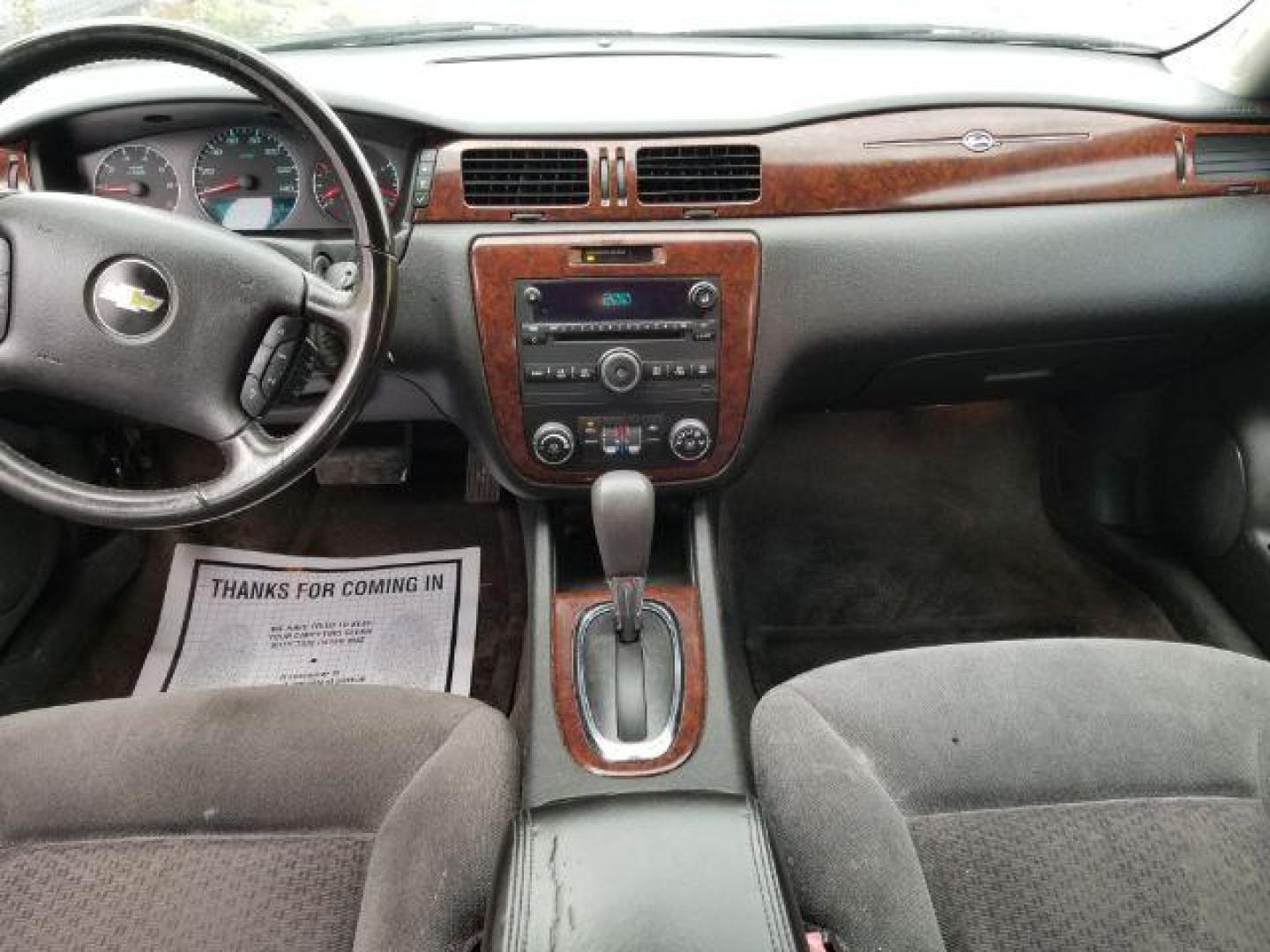 2011 Chevrolet Impala LT (2G1WG5EK4B1) with an 3.5L V6 OHV 16V FFV engine, 4-Speed Automatic transmission, located at 4801 10th Ave S,, Great Falls, MT, 59405, 47.494347, -111.229942 - Photo#11