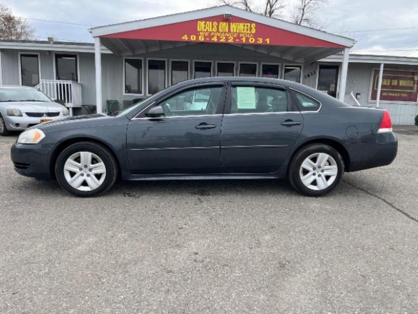 2011 Chevrolet Impala LS (2G1WF5EK4B1) with an 3.5L V6 OHV 16V FFV engine, 4-Speed Automatic transmission, located at 1821 N Montana Ave., Helena, MT, 59601, 46.603447, -112.022781 - Photo#1