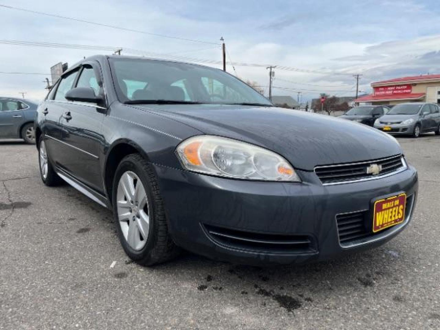 2011 Chevrolet Impala LS (2G1WF5EK4B1) with an 3.5L V6 OHV 16V FFV engine, 4-Speed Automatic transmission, located at 1821 N Montana Ave., Helena, MT, 59601, 46.603447, -112.022781 - Photo#2