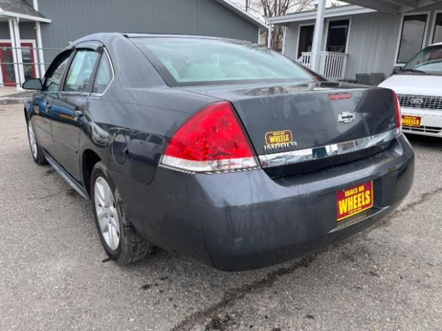 2011 Chevrolet Impala LS (2G1WF5EK4B1) with an 3.5L V6 OHV 16V FFV engine, 4-Speed Automatic transmission, located at 1821 N Montana Ave., Helena, MT, 59601, 46.603447, -112.022781 - Photo#3