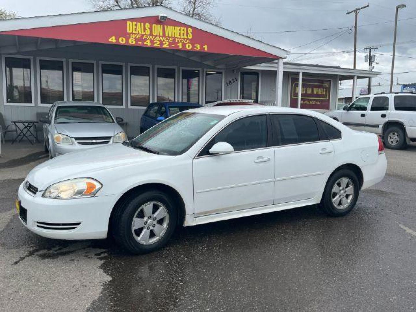 2011 Summit White Chevrolet Impala LS (2G1WF5EK9B1) with an 3.5L V6 OHV 16V FFV engine, 4-Speed Automatic transmission, located at 1821 N Montana Ave., Helena, MT, 59601, 46.603447, -112.022781 - Photo#0