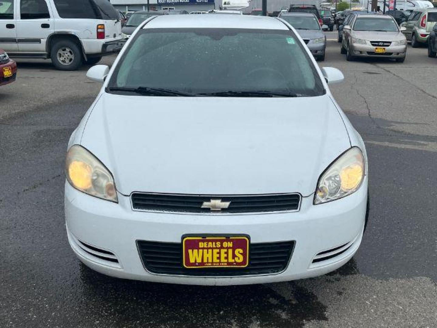 2011 Summit White Chevrolet Impala LS (2G1WF5EK9B1) with an 3.5L V6 OHV 16V FFV engine, 4-Speed Automatic transmission, located at 1821 N Montana Ave., Helena, MT, 59601, 46.603447, -112.022781 - Photo#1