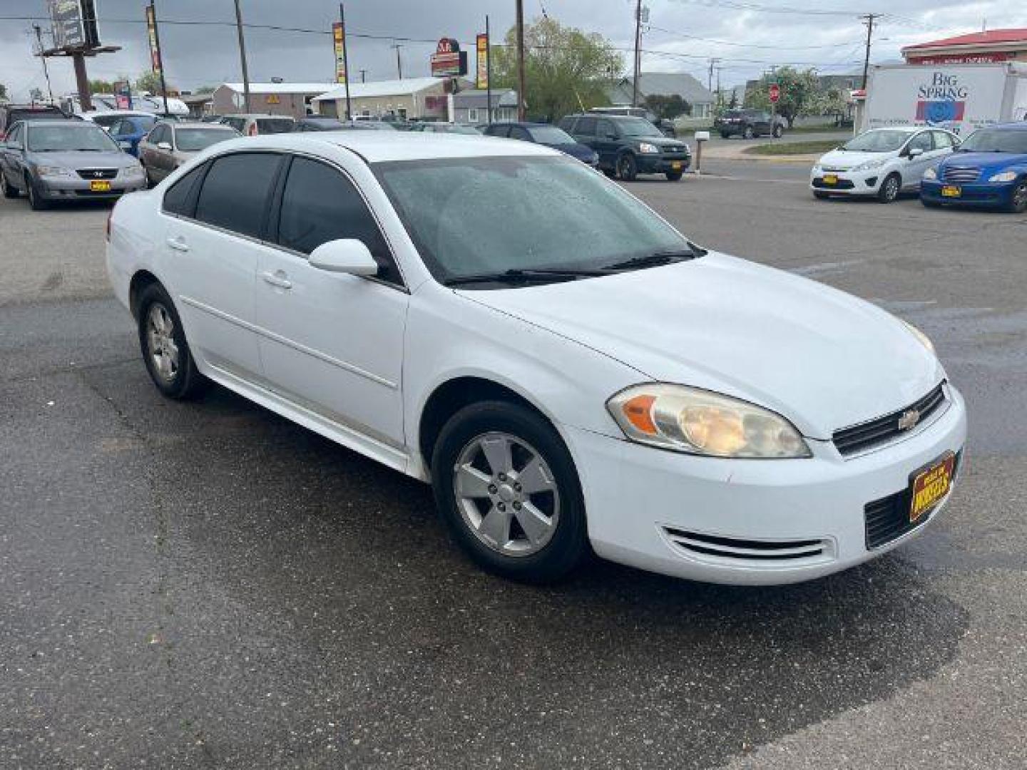 2011 Summit White Chevrolet Impala LS (2G1WF5EK9B1) with an 3.5L V6 OHV 16V FFV engine, 4-Speed Automatic transmission, located at 1821 N Montana Ave., Helena, MT, 59601, 46.603447, -112.022781 - Photo#2