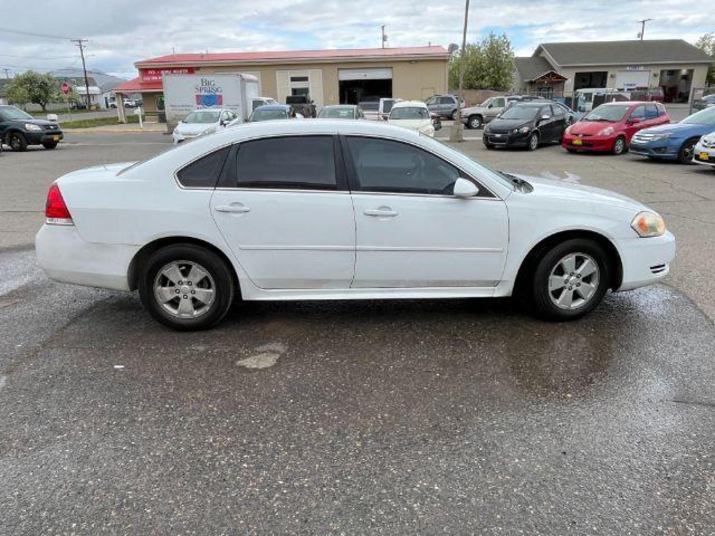 2011 Summit White Chevrolet Impala LS (2G1WF5EK9B1) with an 3.5L V6 OHV 16V FFV engine, 4-Speed Automatic transmission, located at 1821 N Montana Ave., Helena, MT, 59601, 46.603447, -112.022781 - Photo#3