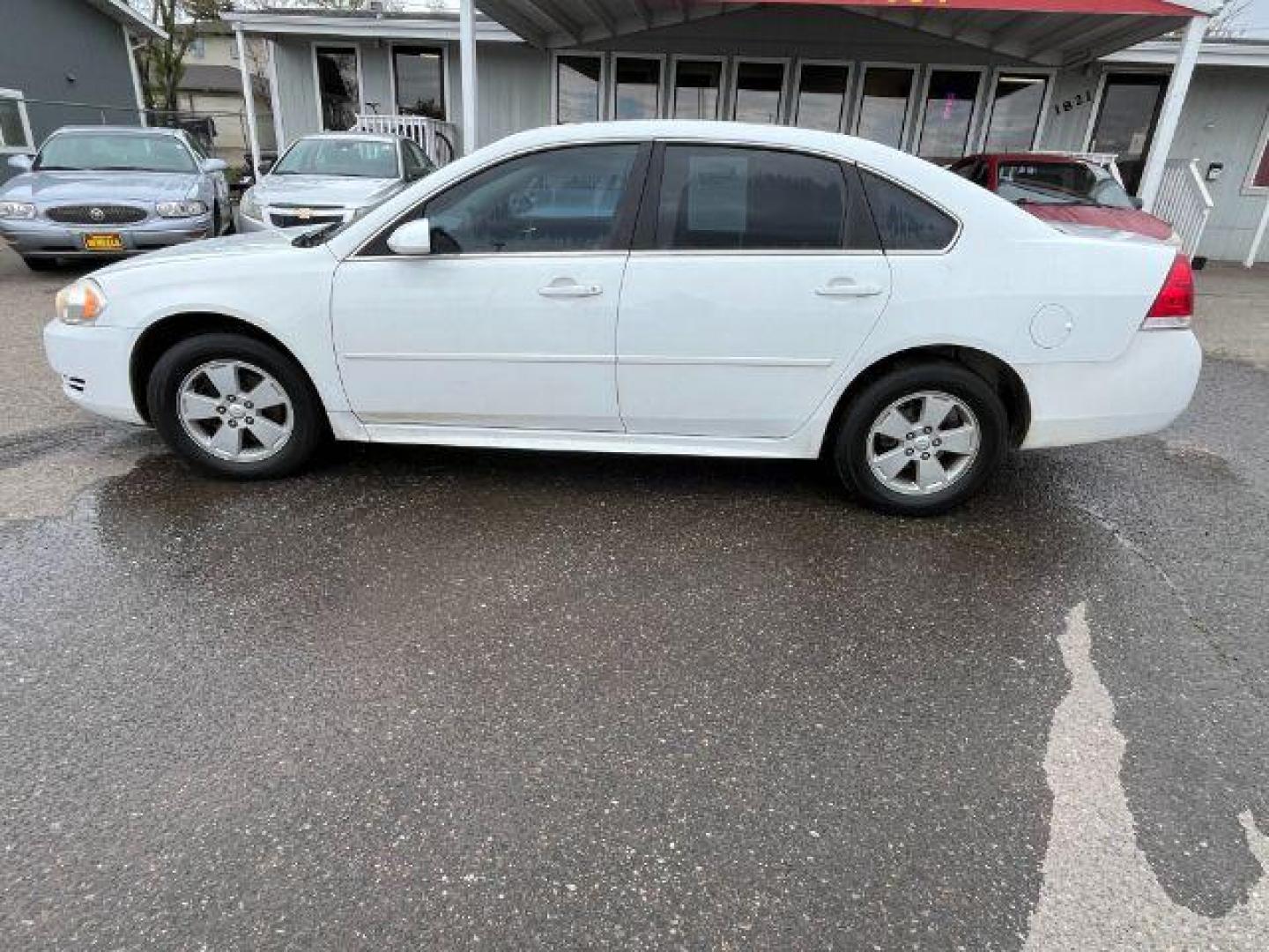 2011 Summit White Chevrolet Impala LS (2G1WF5EK9B1) with an 3.5L V6 OHV 16V FFV engine, 4-Speed Automatic transmission, located at 1821 N Montana Ave., Helena, MT, 59601, 46.603447, -112.022781 - Photo#6