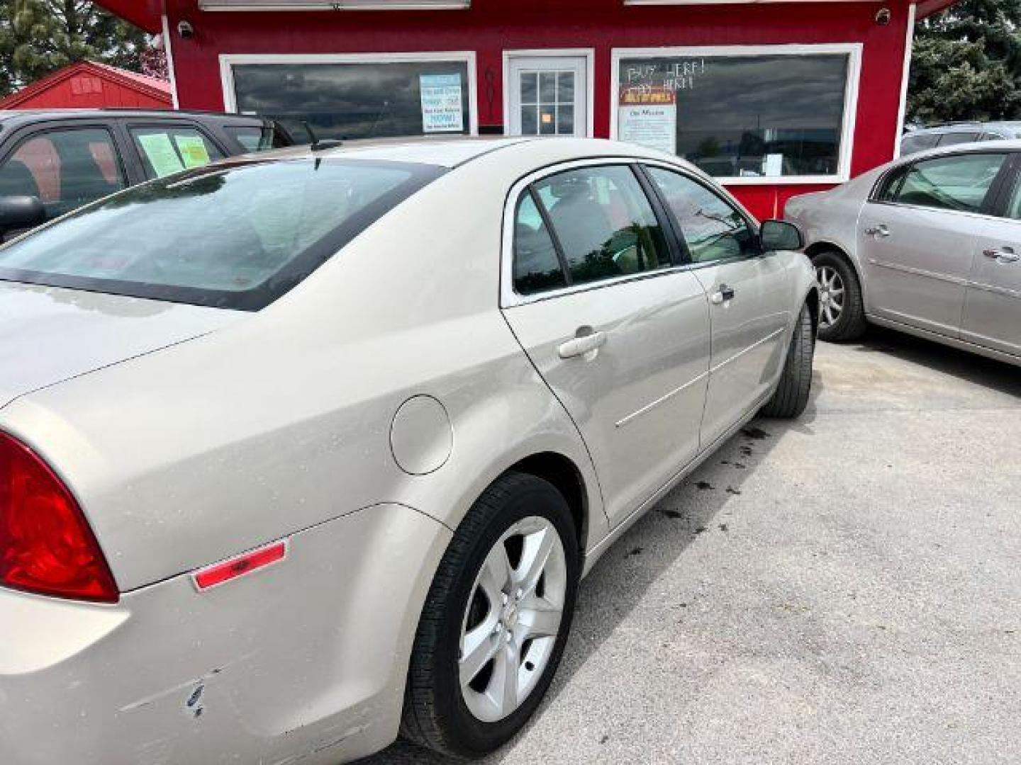 2011 Chevrolet Malibu LS (1G1ZB5E16BF) with an 2.4L L4 DOHC 16V engine, 6-Speed Automatic transmission, located at 601 E. Idaho St., Kalispell, MT, 59901, 48.203983, -114.308662 - Photo#2