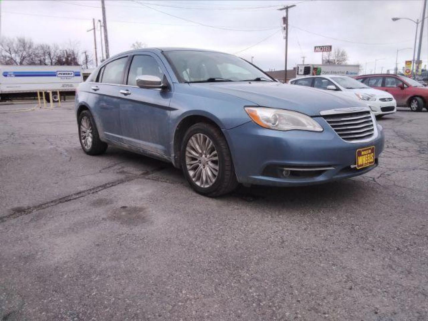 2011 Chrysler 200 Limited (1C3BC2FG4BN) with an 3.6L V6 DOHC 24V FFV engine, 6-Speed Automatic transmission, located at 4047 Montana Ave., Billings, MT, 59101, 45.770847, -108.529800 - Photo#2