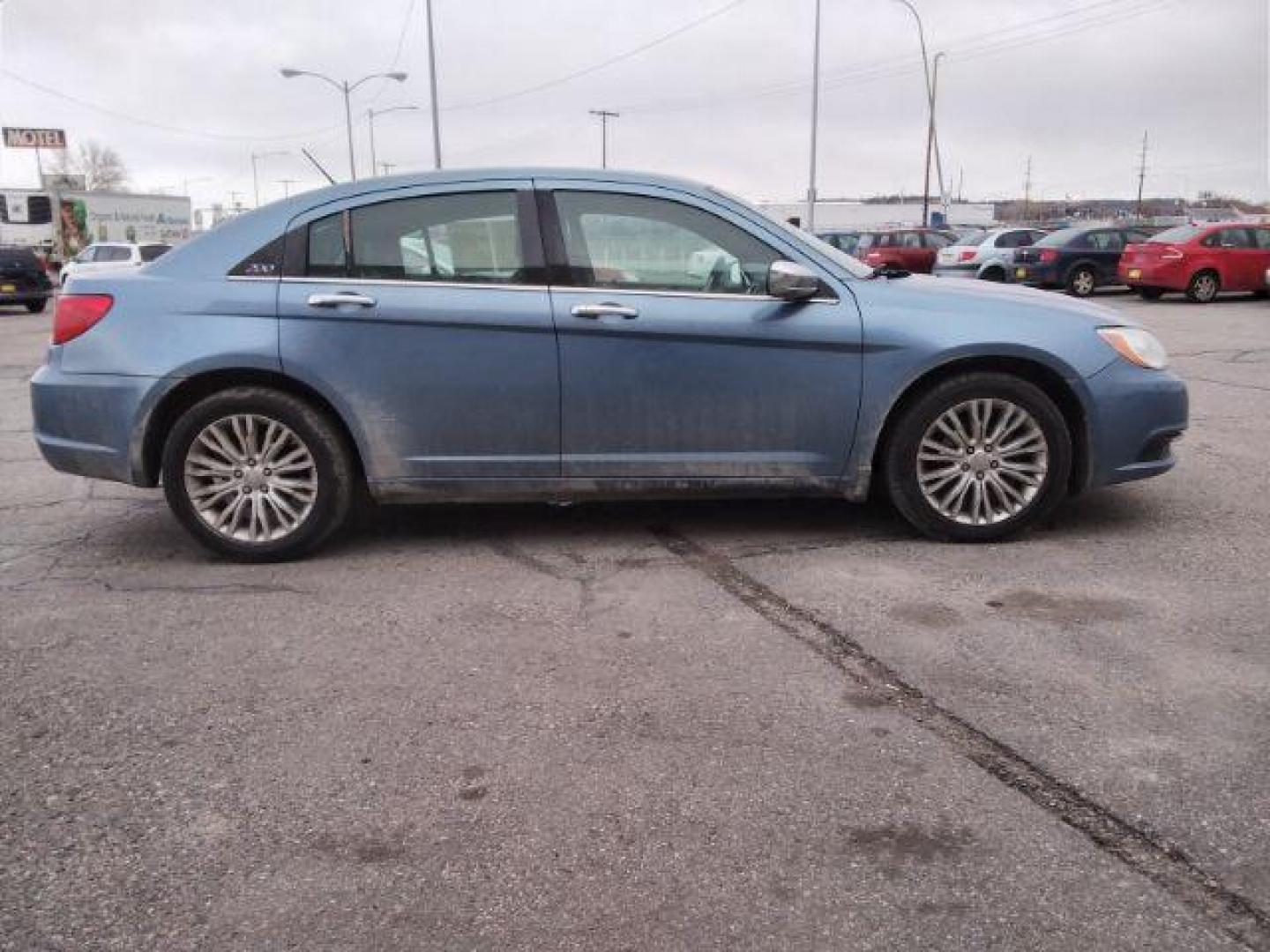 2011 Chrysler 200 Limited (1C3BC2FG4BN) with an 3.6L V6 DOHC 24V FFV engine, 6-Speed Automatic transmission, located at 4047 Montana Ave., Billings, MT, 59101, 45.770847, -108.529800 - Photo#3