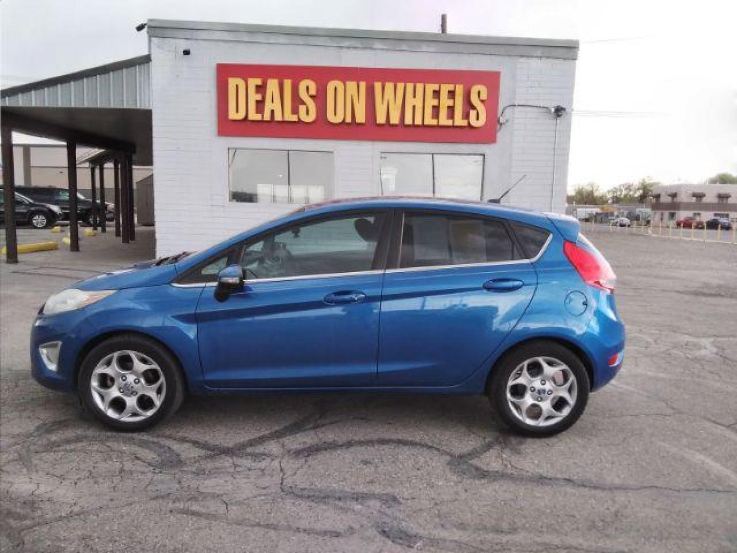 2011 Ford Fiesta SES Hatchback (3FADP4FJ6BM) with an 1.6L L4 DOHC 16V engine, located at 4047 Montana Ave., Billings, MT, 59101, 45.770847, -108.529800 - Photo#0