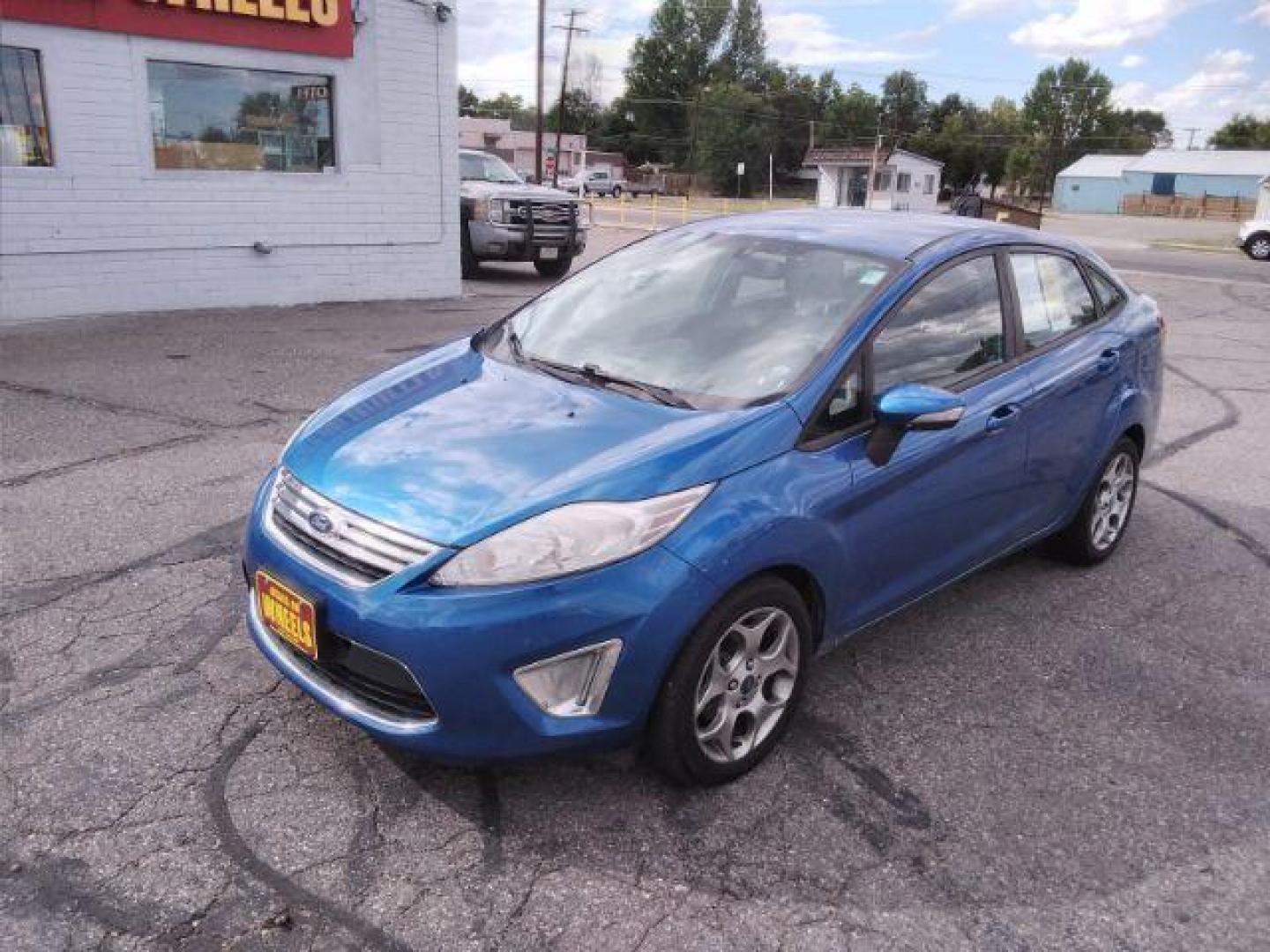 2011 Ford Fiesta SEL Sedan (3FADP4CJ7BM) with an 1.6L L4 DOHC 16V engine, located at 4047 Montana Ave., Billings, MT, 59101, 45.770847, -108.529800 - Photo#0