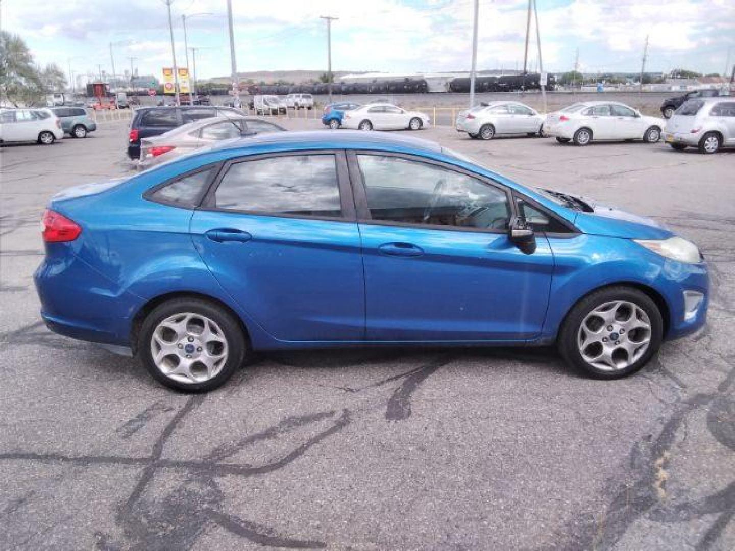 2011 Ford Fiesta SEL Sedan (3FADP4CJ7BM) with an 1.6L L4 DOHC 16V engine, located at 4047 Montana Ave., Billings, MT, 59101, 45.770847, -108.529800 - Photo#3