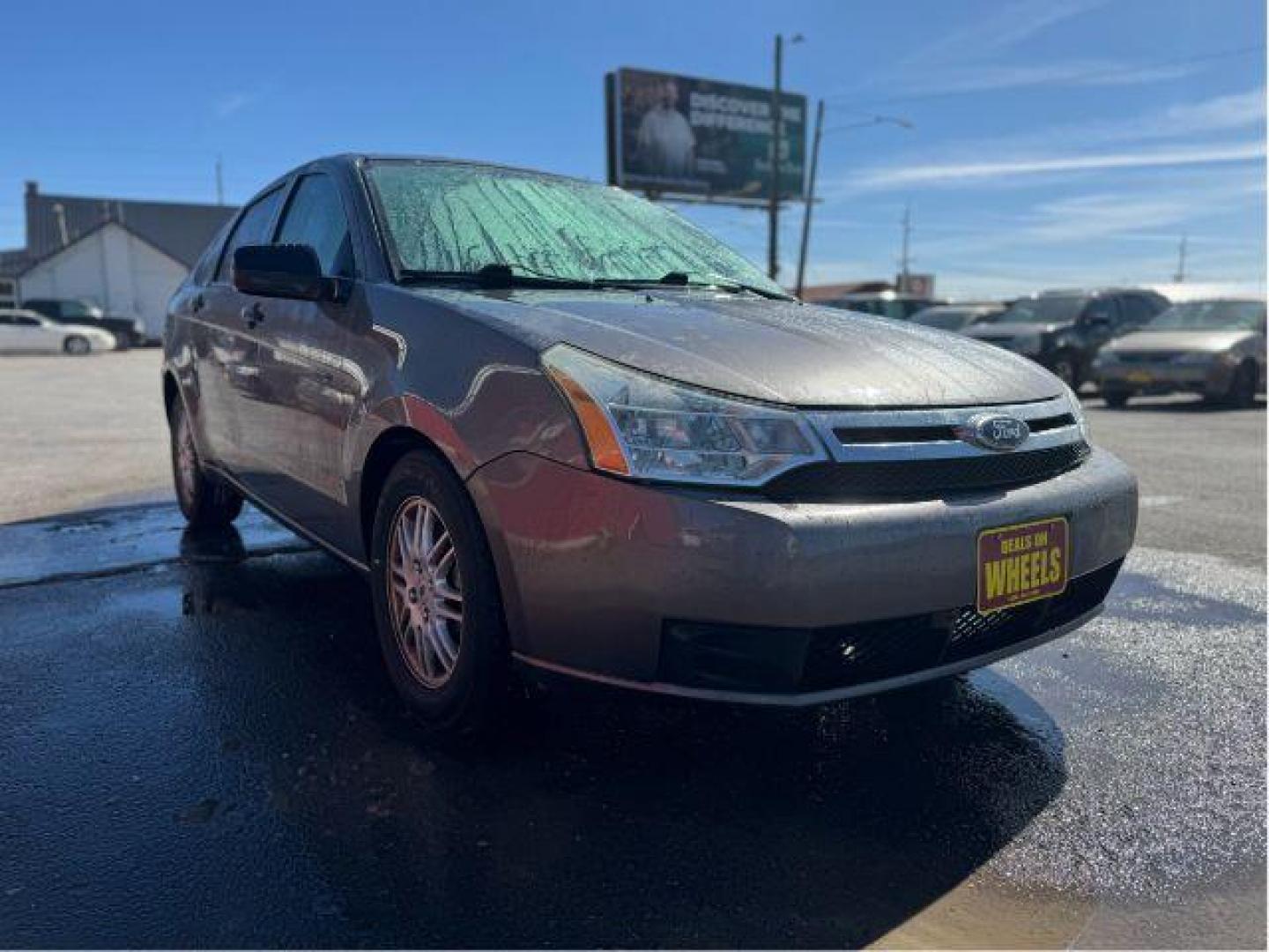 2011 Ford Focus SE Sedan (1FAHP3FN1BW) with an 2.0L L4 DOHC 16V engine, located at 601 E. Idaho St., Kalispell, MT, 59901, 48.203983, -114.308662 - Photo#6