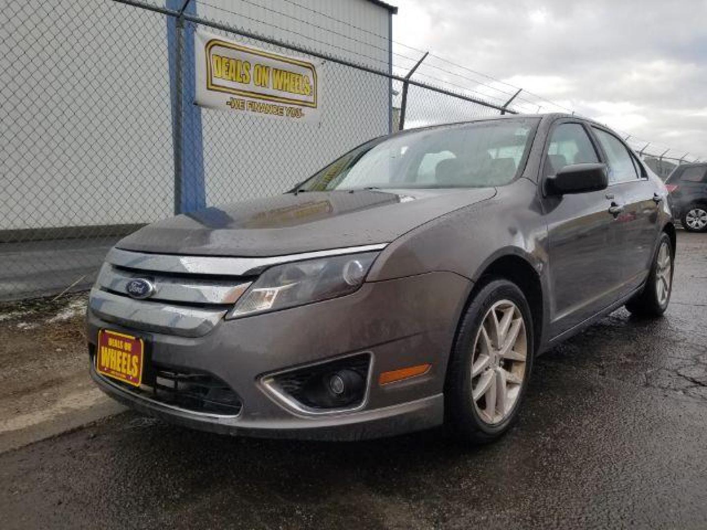 2011 Ford Fusion V6 SEL (3FAHP0JG4BR) with an 3.0L V6 DOHC 24V engine, located at 4801 10th Ave S,, Great Falls, MT, 59405, 47.494347, -111.229942 - Photo#0