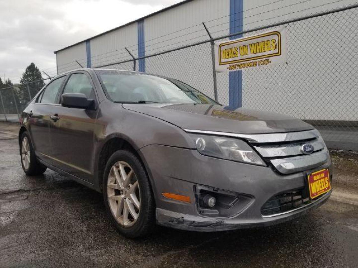 2011 Ford Fusion V6 SEL (3FAHP0JG4BR) with an 3.0L V6 DOHC 24V engine, located at 4801 10th Ave S,, Great Falls, MT, 59405, 47.494347, -111.229942 - Photo#2