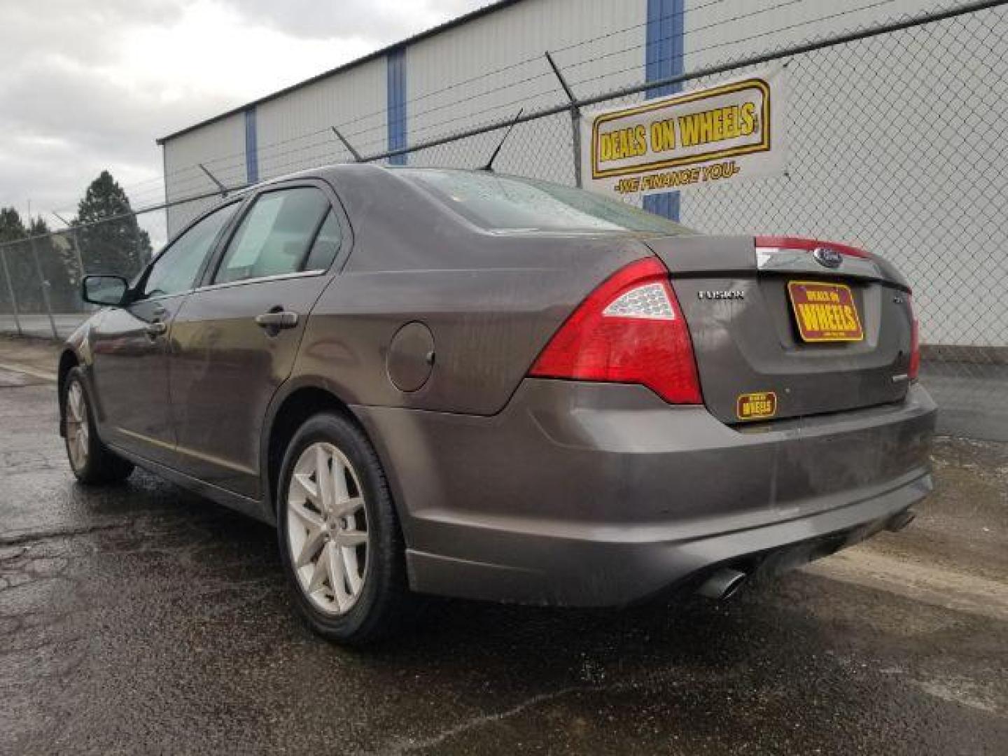 2011 Ford Fusion V6 SEL (3FAHP0JG4BR) with an 3.0L V6 DOHC 24V engine, located at 4801 10th Ave S,, Great Falls, MT, 59405, 47.494347, -111.229942 - Photo#5