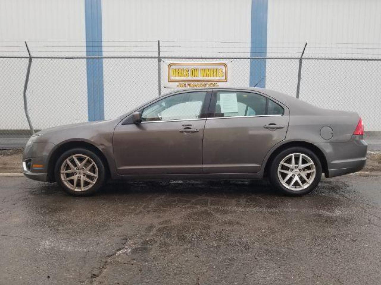 2011 Ford Fusion V6 SEL (3FAHP0JG4BR) with an 3.0L V6 DOHC 24V engine, located at 4801 10th Ave S,, Great Falls, MT, 59405, 47.494347, -111.229942 - Photo#6