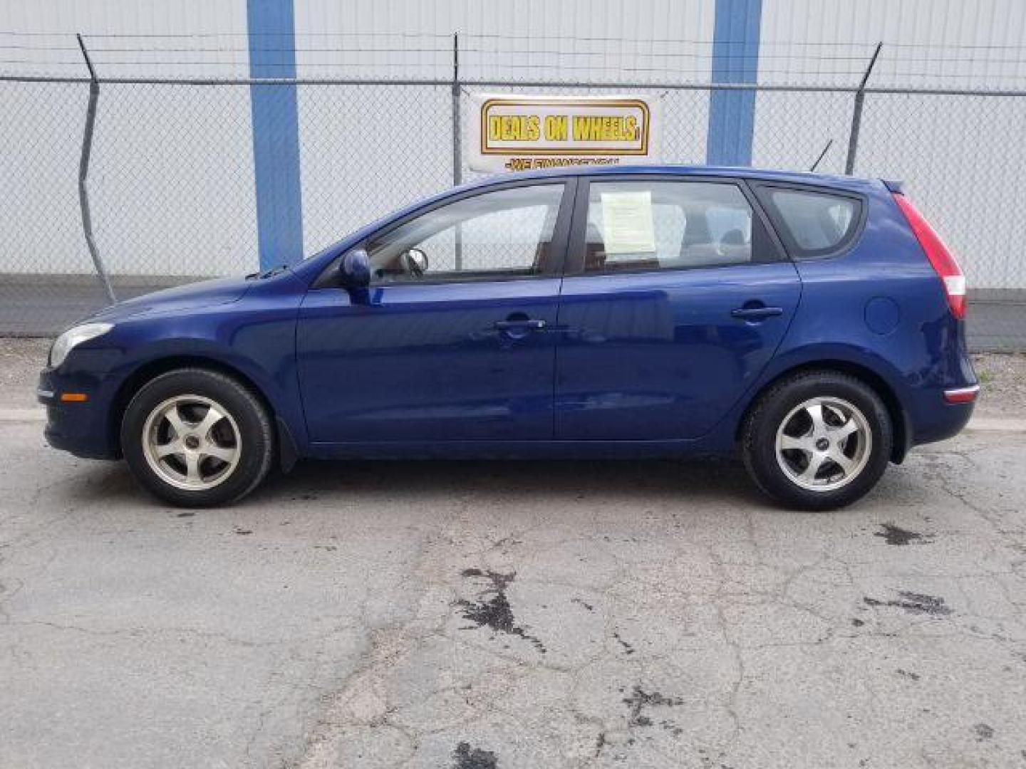 2011 Hyundai Elantra Touring SE Manual (KMHDB8AE0BU) with an 2.0L L4 DOHC 16V engine, 5-Speed Manual transmission, located at 4047 Montana Ave., Billings, MT, 59101, 45.770847, -108.529800 - Photo#2