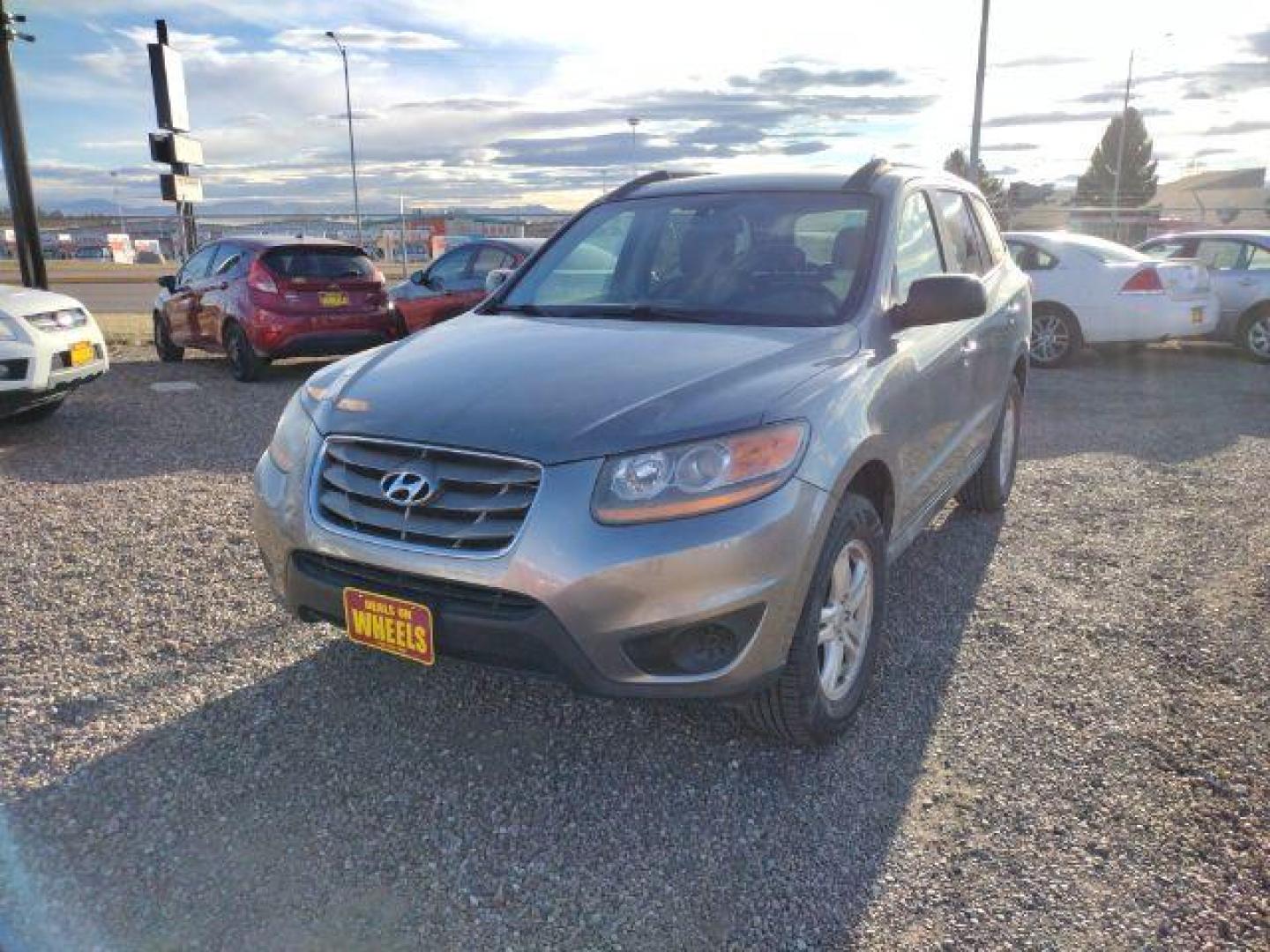 2011 Hyundai Santa Fe GLS 3.5 FWD (5XYZG4AG0BG) with an 3.5L V6 DOHC 24V engine, 6-Speed Automatic transmission, located at 4801 10th Ave S,, Great Falls, MT, 59405, 47.494347, -111.229942 - Photo#0