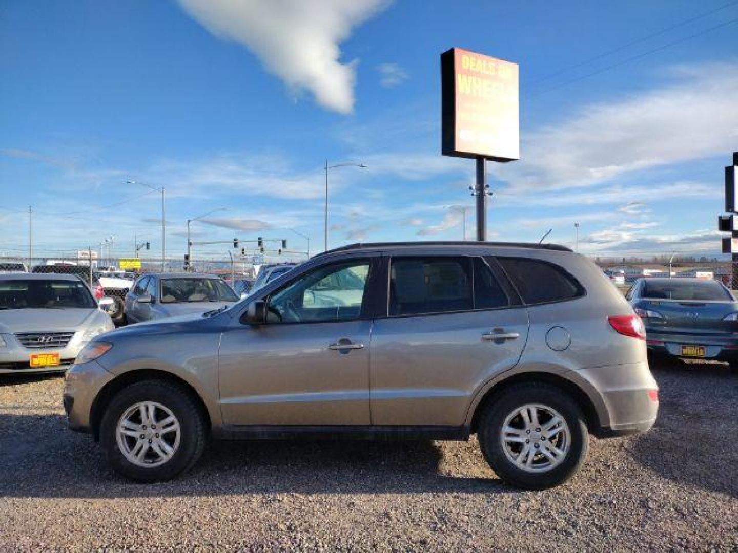 2011 Hyundai Santa Fe GLS 3.5 FWD (5XYZG4AG0BG) with an 3.5L V6 DOHC 24V engine, 6-Speed Automatic transmission, located at 4801 10th Ave S,, Great Falls, MT, 59405, 47.494347, -111.229942 - Photo#1