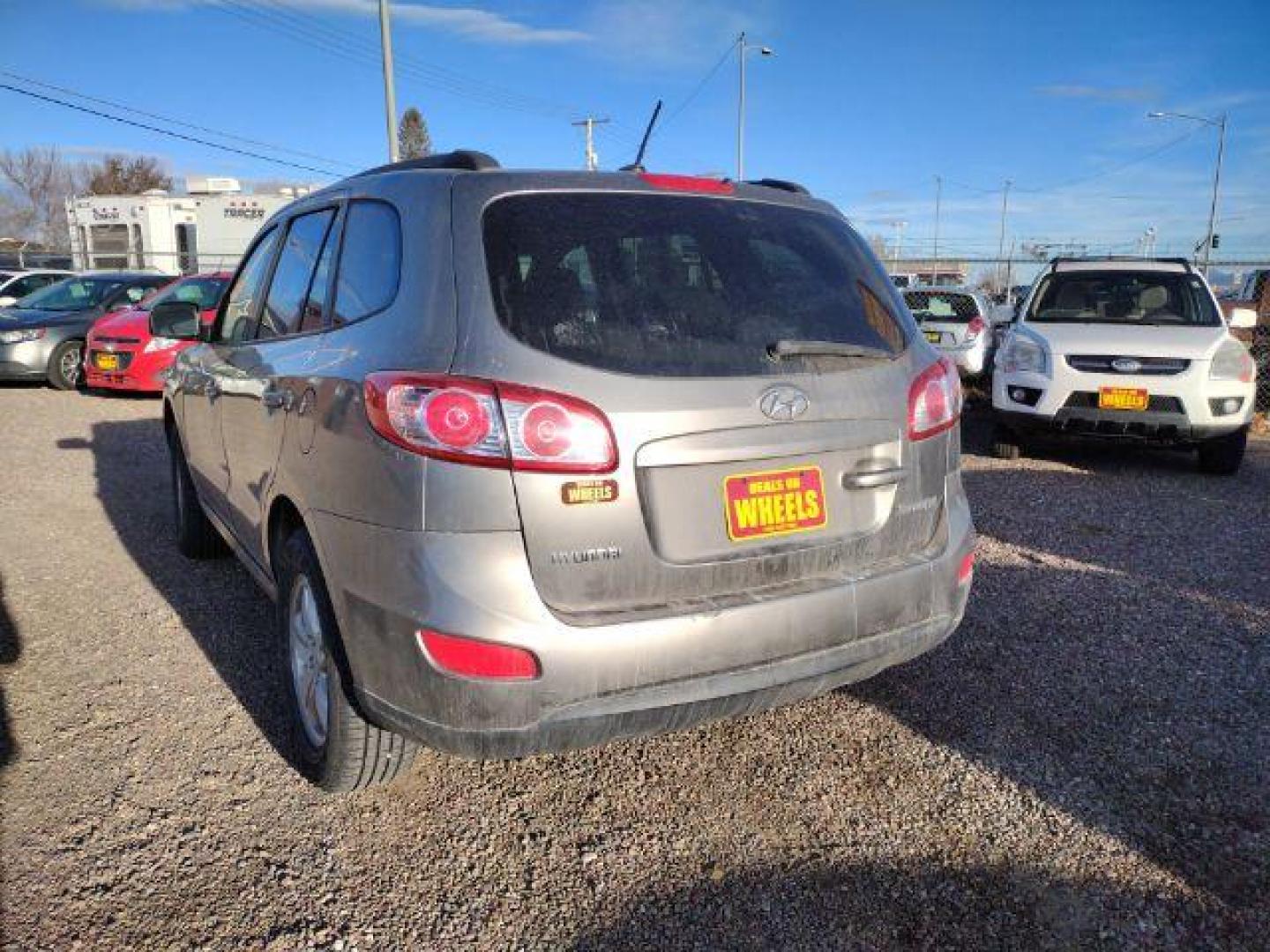 2011 Hyundai Santa Fe GLS 3.5 FWD (5XYZG4AG0BG) with an 3.5L V6 DOHC 24V engine, 6-Speed Automatic transmission, located at 4801 10th Ave S,, Great Falls, MT, 59405, 47.494347, -111.229942 - Photo#2