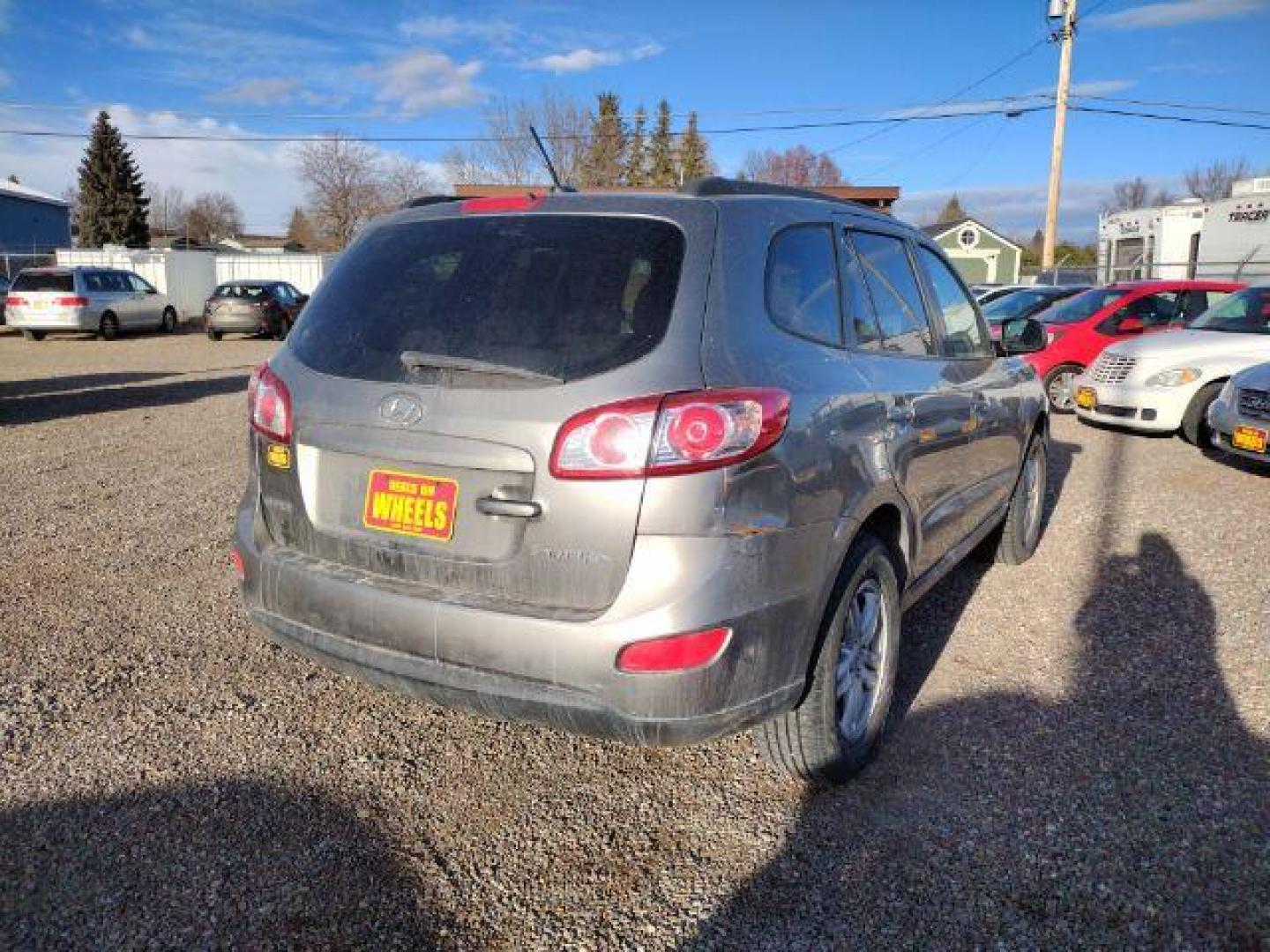 2011 Hyundai Santa Fe GLS 3.5 FWD (5XYZG4AG0BG) with an 3.5L V6 DOHC 24V engine, 6-Speed Automatic transmission, located at 4801 10th Ave S,, Great Falls, MT, 59405, 47.494347, -111.229942 - Photo#4