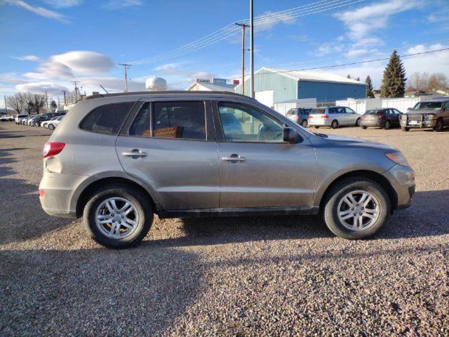 2011 Hyundai Santa Fe GLS 3.5 FWD (5XYZG4AG0BG) with an 3.5L V6 DOHC 24V engine, 6-Speed Automatic transmission, located at 4801 10th Ave S,, Great Falls, MT, 59405, 47.494347, -111.229942 - Photo#5