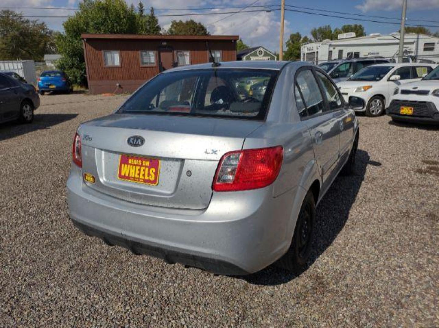 2011 Kia Rio LX (KNADH4A35B6) with an 1.6L L4 DOHC 16V engine, 4-Speed Automatic transmission, located at 4801 10th Ave S,, Great Falls, MT, 59405, 47.494347, -111.229942 - Photo#4