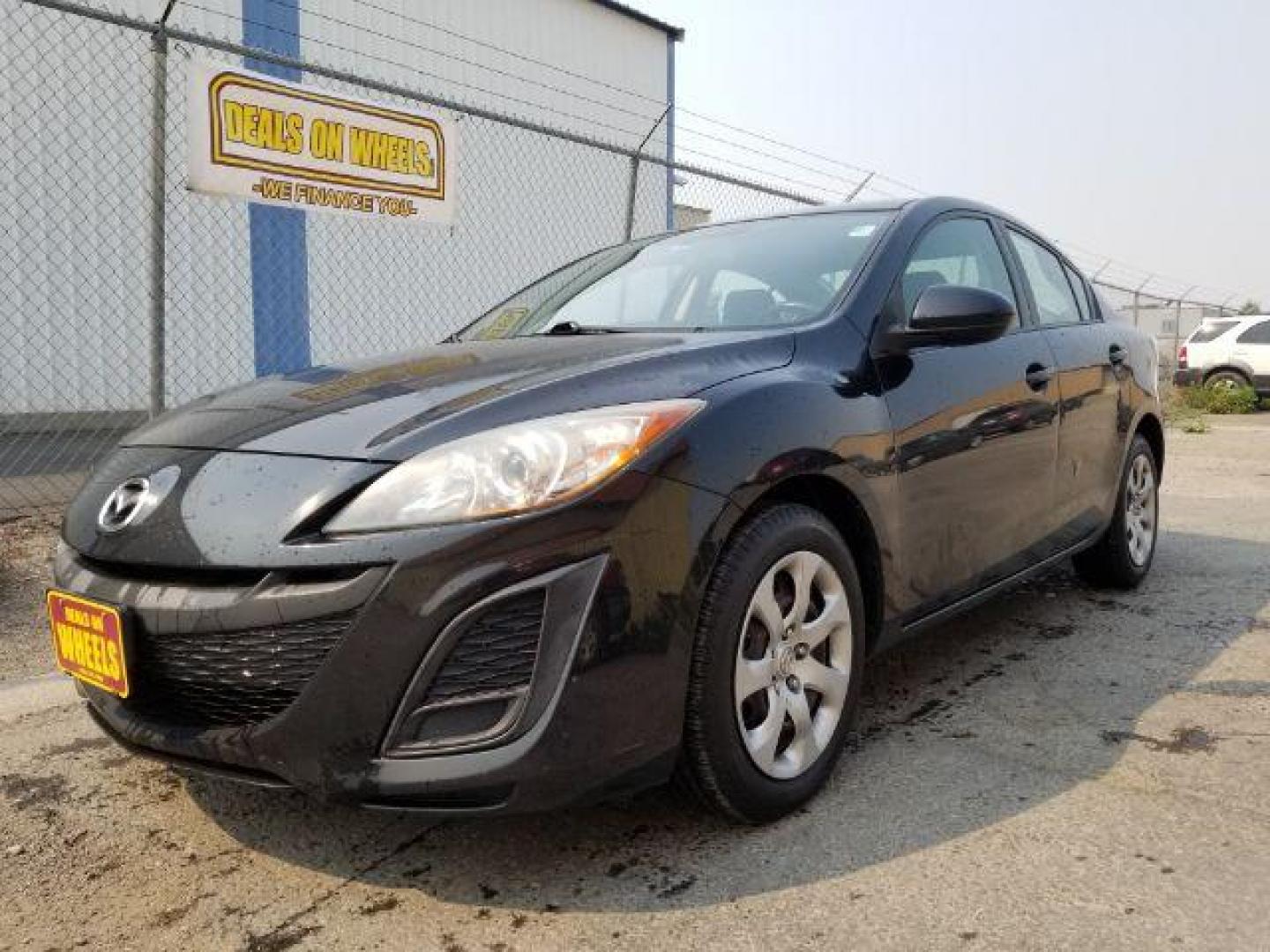 2011 Black Mica Mazda MAZDA3 i Sport 4-Door (JM1BL1UG6B1) with an 2.0L L4 DOHC 16V engine, located at 4801 10th Ave S,, Great Falls, MT, 59405, 47.494347, -111.229942 - Photo#0