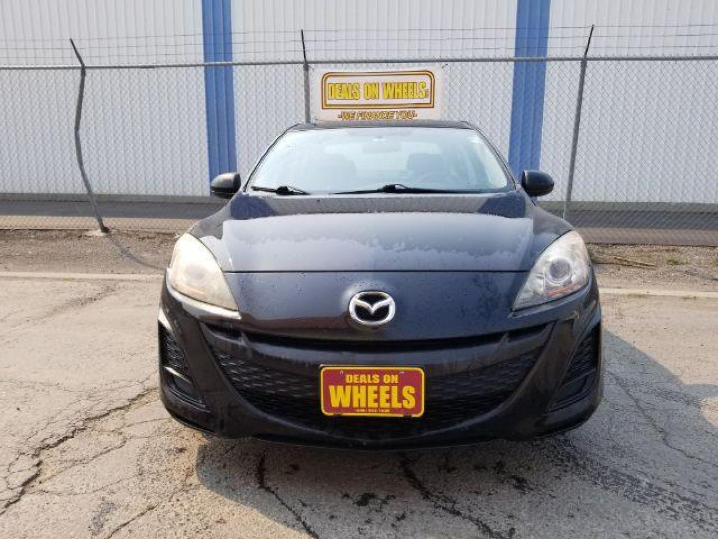 2011 Black Mica Mazda MAZDA3 i Sport 4-Door (JM1BL1UG6B1) with an 2.0L L4 DOHC 16V engine, located at 4801 10th Ave S,, Great Falls, MT, 59405, 47.494347, -111.229942 - Photo#1