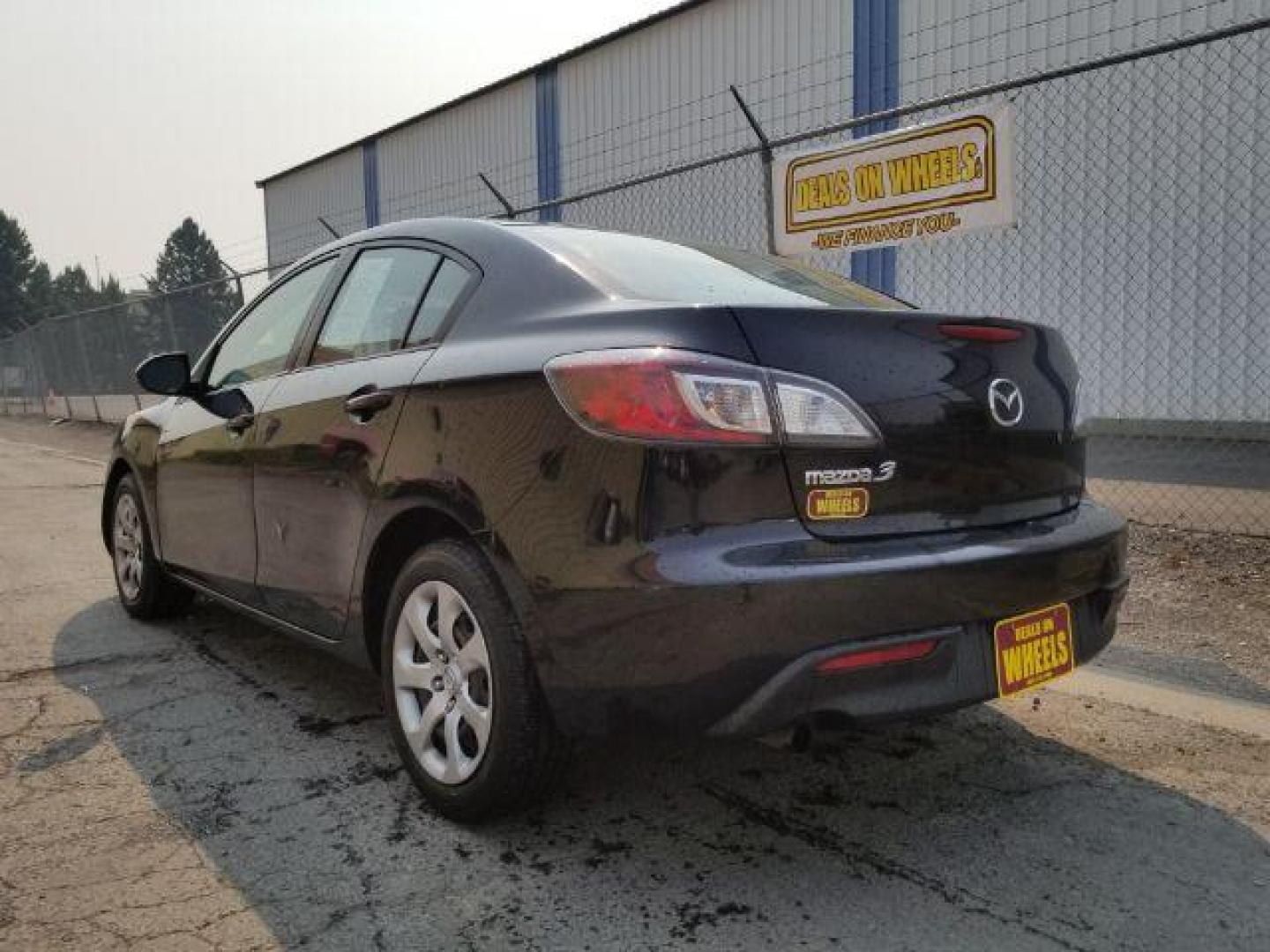 2011 Black Mica Mazda MAZDA3 i Sport 4-Door (JM1BL1UG6B1) with an 2.0L L4 DOHC 16V engine, located at 4801 10th Ave S,, Great Falls, MT, 59405, 47.494347, -111.229942 - Photo#3