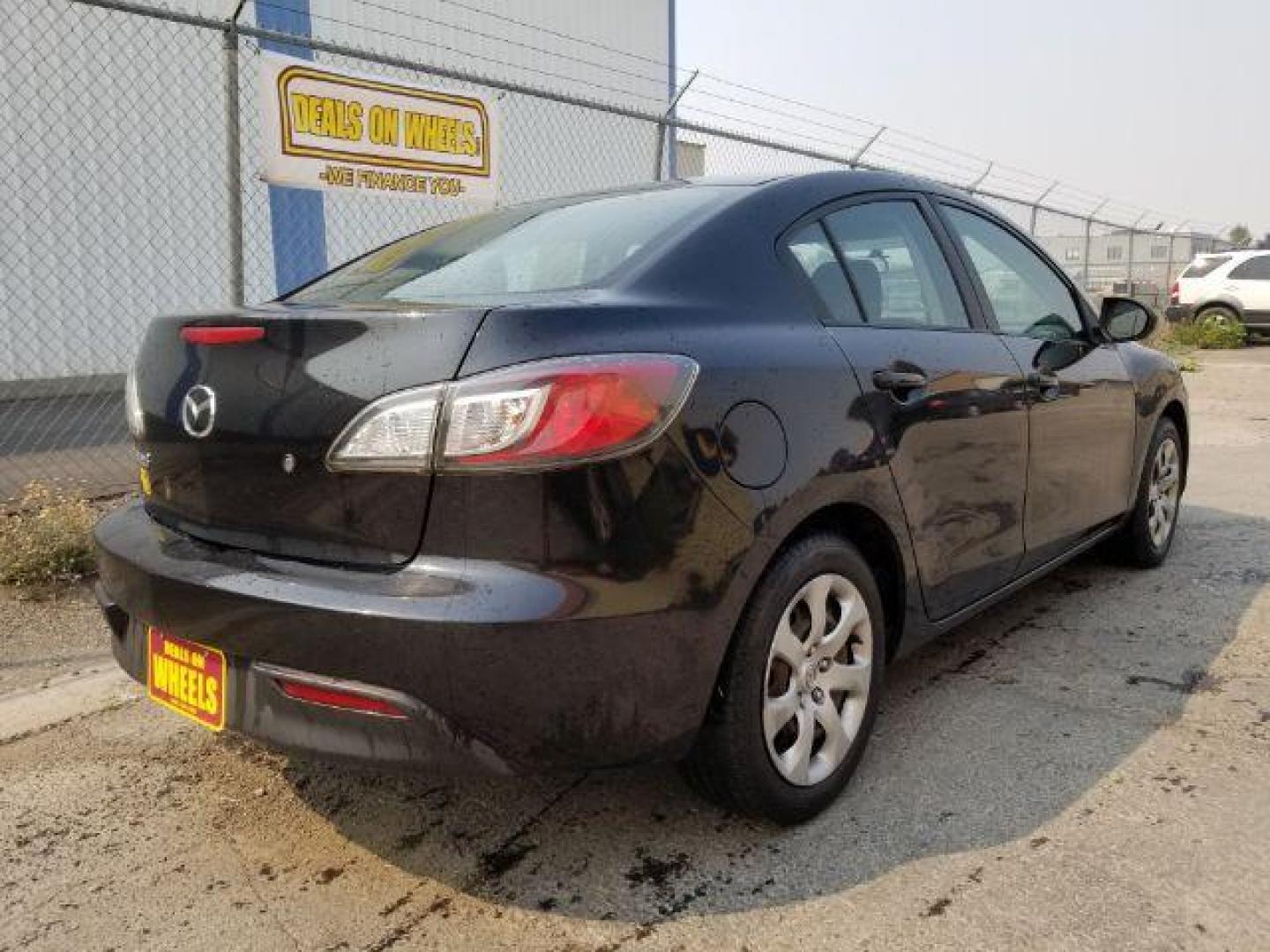 2011 Black Mica Mazda MAZDA3 i Sport 4-Door (JM1BL1UG6B1) with an 2.0L L4 DOHC 16V engine, located at 4801 10th Ave S,, Great Falls, MT, 59405, 47.494347, -111.229942 - Photo#4