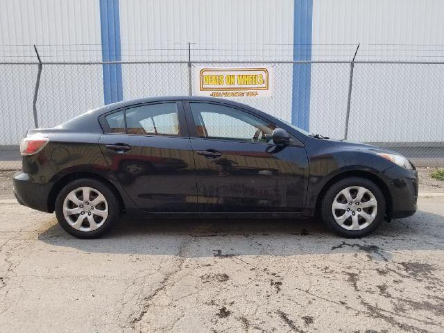 2011 Black Mica Mazda MAZDA3 i Sport 4-Door (JM1BL1UG6B1) with an 2.0L L4 DOHC 16V engine, located at 4801 10th Ave S,, Great Falls, MT, 59405, 47.494347, -111.229942 - Photo#5