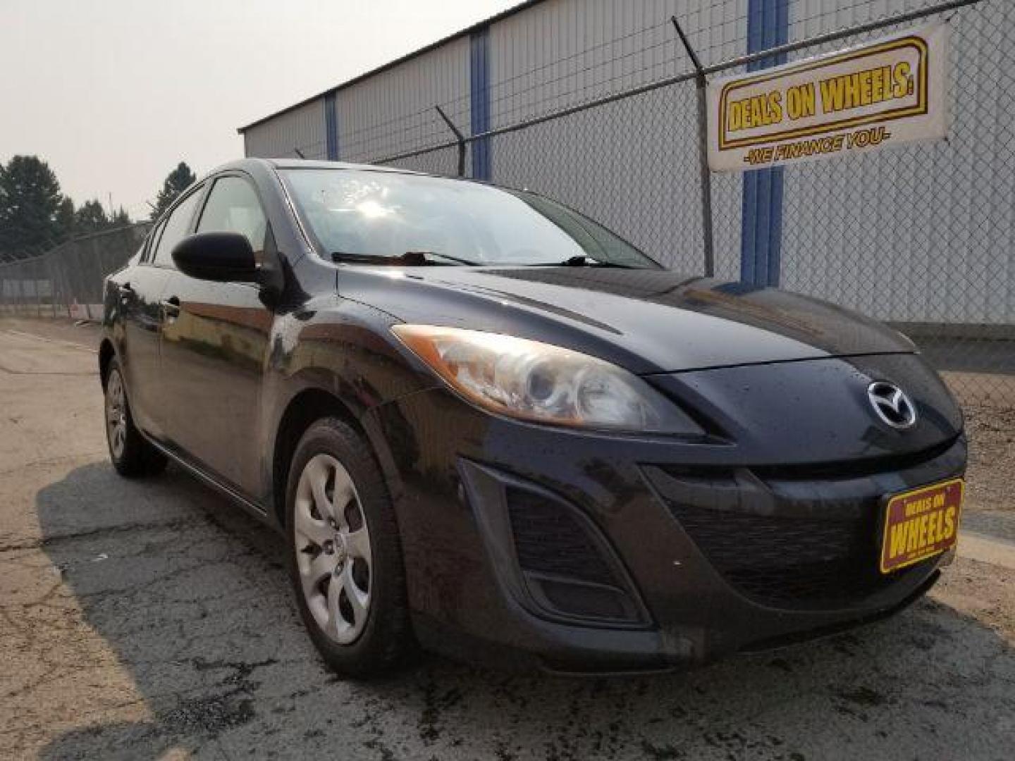 2011 Black Mica Mazda MAZDA3 i Sport 4-Door (JM1BL1UG6B1) with an 2.0L L4 DOHC 16V engine, located at 4801 10th Ave S,, Great Falls, MT, 59405, 47.494347, -111.229942 - Photo#6