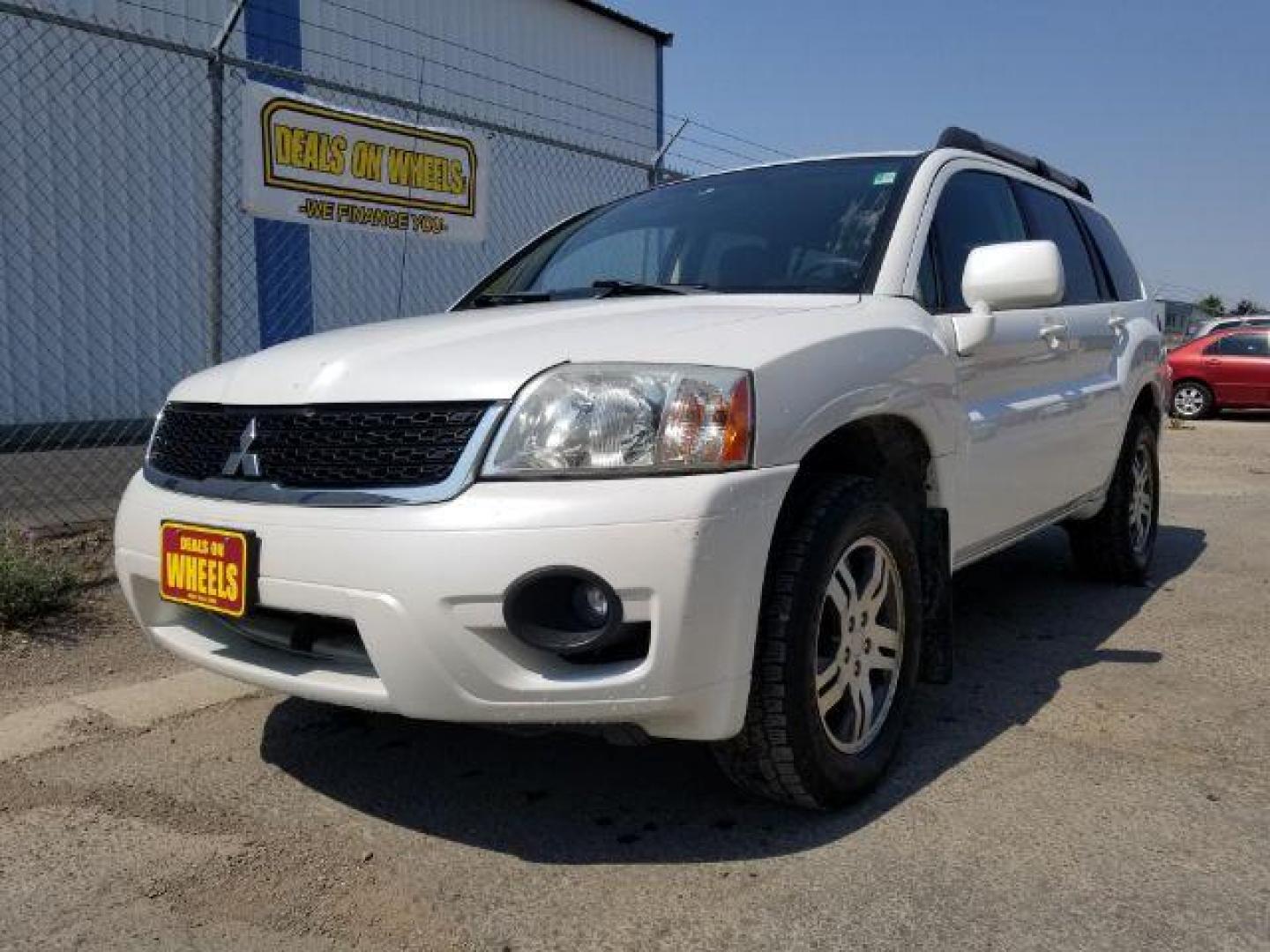 2011 Mitsubishi Endeavor LS AWD (4A4JN2AS9BE) with an 3.8L V6 SOHC 24V engine, 4-Speed Automatic transmission, located at 4047 Montana Ave., Billings, MT, 59101, 45.770847, -108.529800 - Photo#0