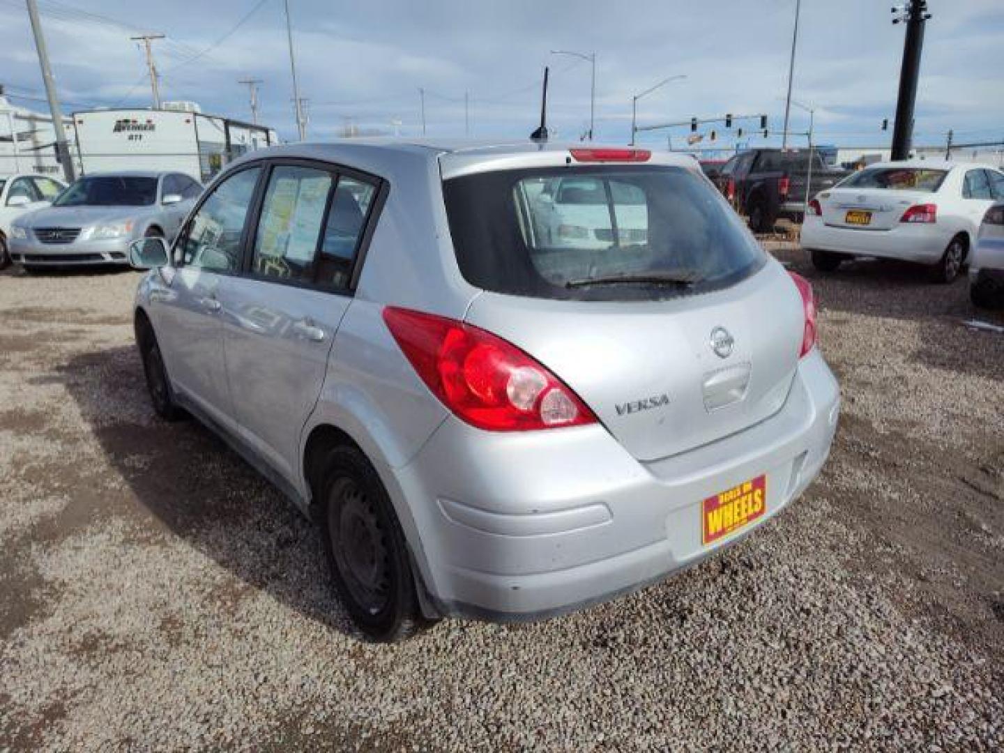 2011 Nissan Versa 1.8 SL Hatchback (3N1BC1CP9BL) with an 1.8L L4 DOHC 16V engine, 6 Speed Manual Trans transmission, located at 4801 10th Ave S,, Great Falls, MT, 59405, 47.494347, -111.229942 - Photo#2