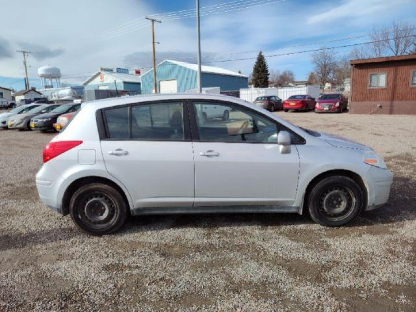 2011 Nissan Versa 1.8 SL Hatchback (3N1BC1CP9BL) with an 1.8L L4 DOHC 16V engine, 6 Speed Manual Trans transmission, located at 4801 10th Ave S,, Great Falls, MT, 59405, 47.494347, -111.229942 - Photo#5