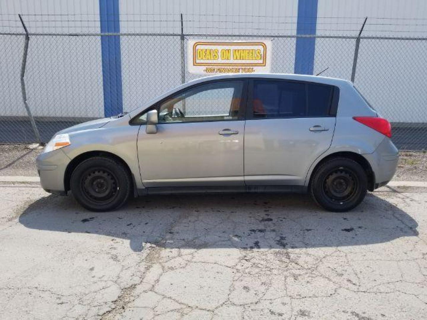 2011 Nissan Versa 1.8 SL Hatchback (3N1BC1CP7BL) with an 1.8L L4 DOHC 16V engine, Continuously Variable Transmission transmission, located at 4801 10th Ave S,, Great Falls, MT, 59405, 47.494347, -111.229942 - Photo#2