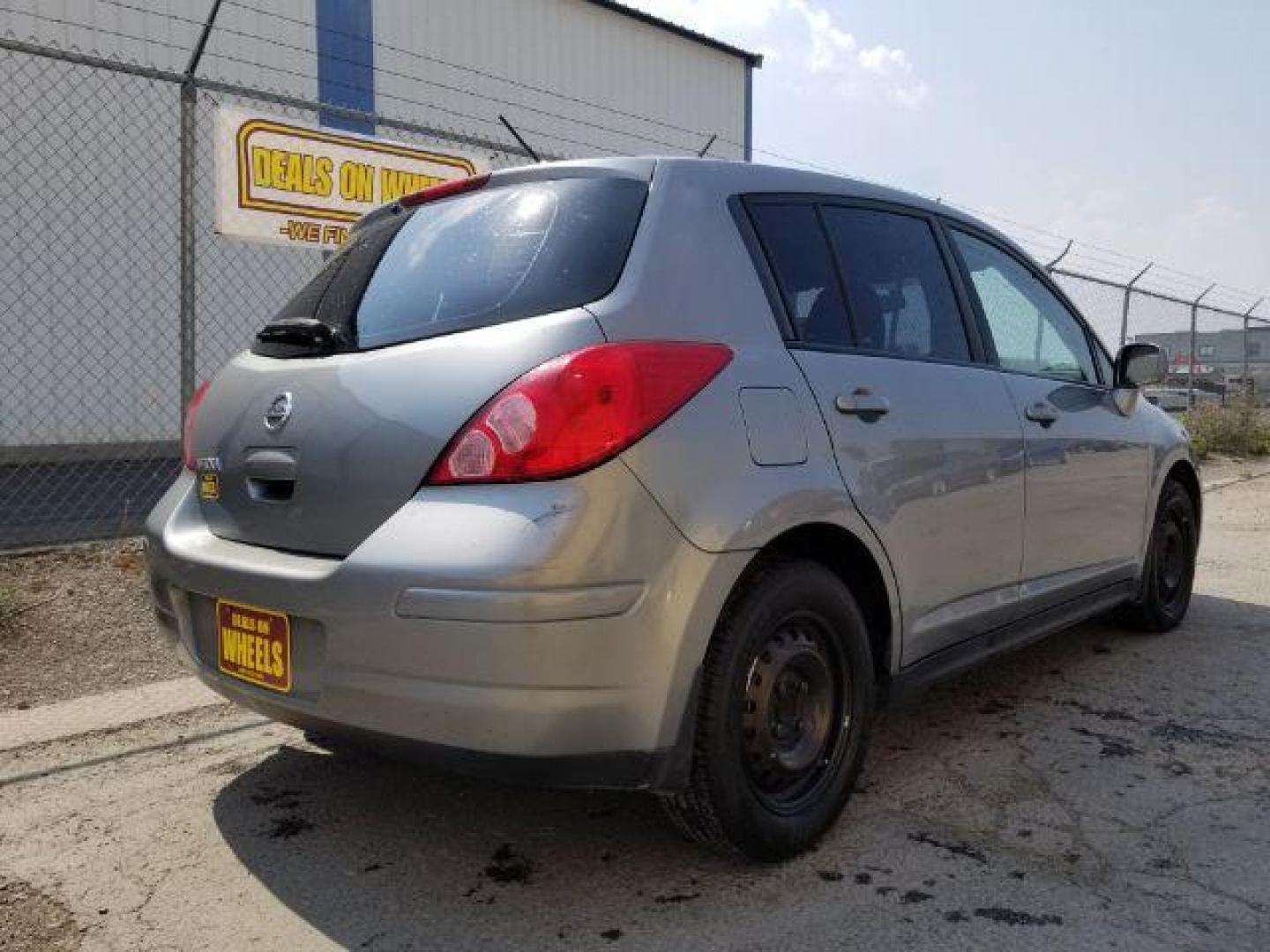 2011 Nissan Versa 1.8 SL Hatchback (3N1BC1CP7BL) with an 1.8L L4 DOHC 16V engine, Continuously Variable Transmission transmission, located at 4801 10th Ave S,, Great Falls, MT, 59405, 47.494347, -111.229942 - Photo#4