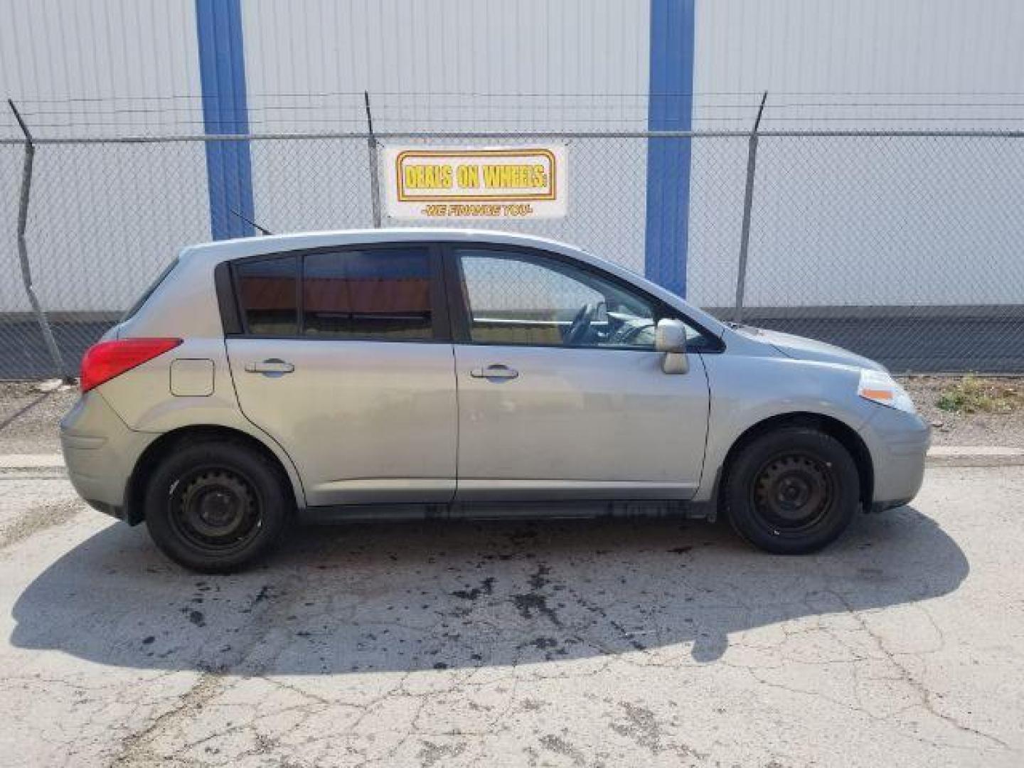 2011 Nissan Versa 1.8 SL Hatchback (3N1BC1CP7BL) with an 1.8L L4 DOHC 16V engine, Continuously Variable Transmission transmission, located at 4801 10th Ave S,, Great Falls, MT, 59405, 47.494347, -111.229942 - Photo#5