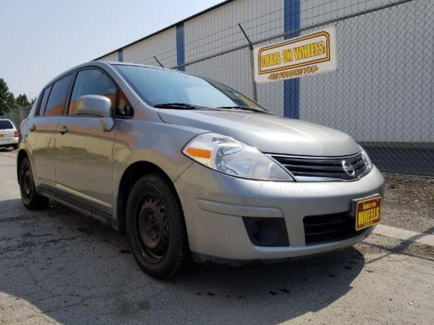 2011 Nissan Versa 1.8 SL Hatchback (3N1BC1CP7BL) with an 1.8L L4 DOHC 16V engine, Continuously Variable Transmission transmission, located at 4801 10th Ave S,, Great Falls, MT, 59405, 47.494347, -111.229942 - Photo#6