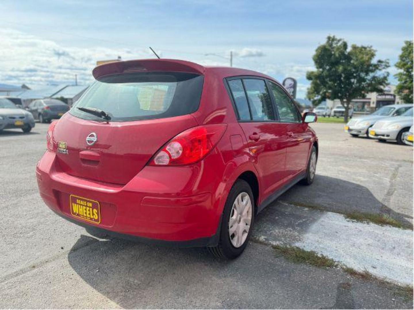 2011 Nissan Versa 1.8 SL Hatchback (3N1BC1CP0BL) with an 1.8L L4 DOHC 16V engine, Continuously Variable Transmission transmission, located at 601 E. Idaho St., Kalispell, MT, 59901, 48.203983, -114.308662 - Photo#3