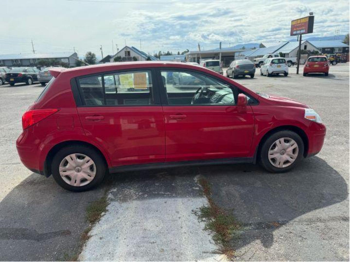 2011 Nissan Versa 1.8 SL Hatchback (3N1BC1CP0BL) with an 1.8L L4 DOHC 16V engine, Continuously Variable Transmission transmission, located at 601 E. Idaho St., Kalispell, MT, 59901, 48.203983, -114.308662 - Photo#4