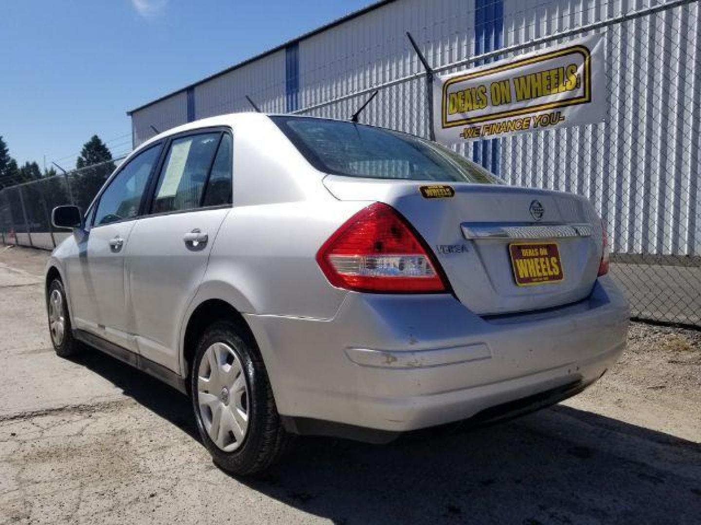 2011 Nissan Versa 1.8 S Sedan (3N1BC1AP7BL) with an 1.8L L4 DOHC 16V engine, located at 601 E. Idaho St., Kalispell, MT, 59901, 48.203983, -114.308662 - Photo#3