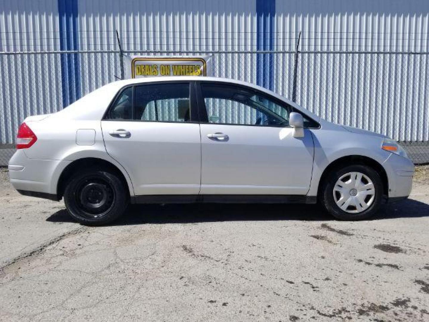 2011 Nissan Versa 1.8 S Sedan (3N1BC1AP7BL) with an 1.8L L4 DOHC 16V engine, located at 601 E. Idaho St., Kalispell, MT, 59901, 48.203983, -114.308662 - Photo#5