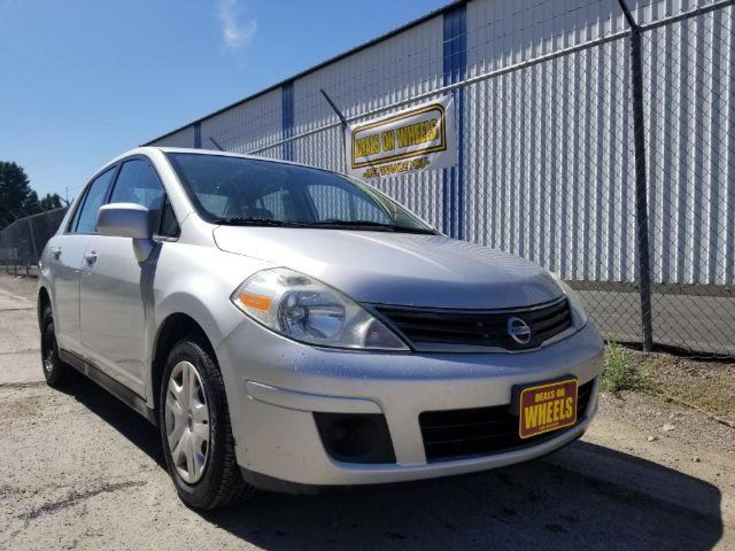 2011 Nissan Versa 1.8 S Sedan (3N1BC1AP7BL) with an 1.8L L4 DOHC 16V engine, located at 601 E. Idaho St., Kalispell, MT, 59901, 48.203983, -114.308662 - Photo#6