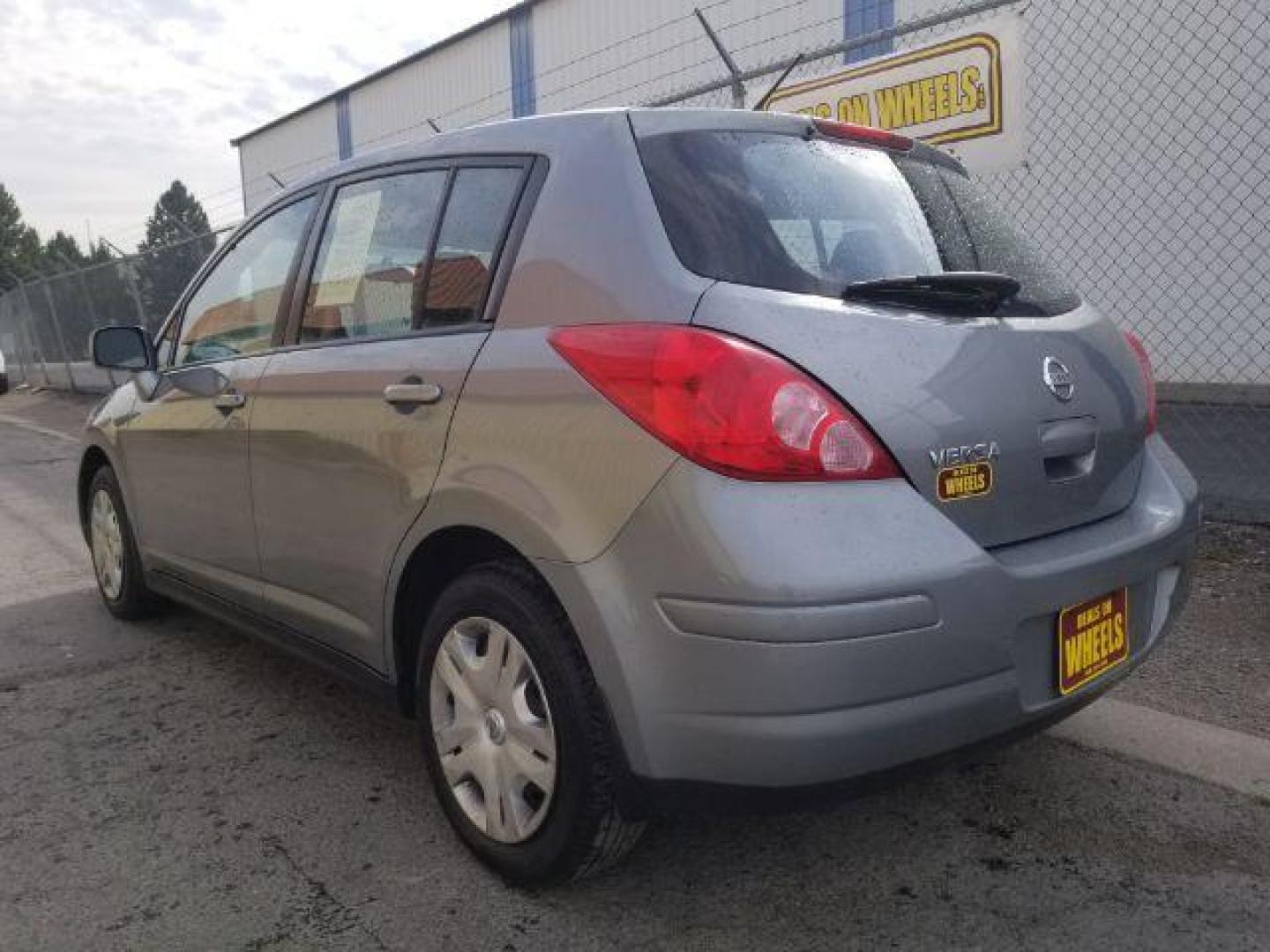 2011 Nissan Versa 1.8 S Hatchback (3N1BC1CP9BL) with an 1.8L L4 DOHC 16V engine, located at 1800 West Broadway, Missoula, 59808, (406) 543-1986, 46.881348, -114.023628 - Photo#3